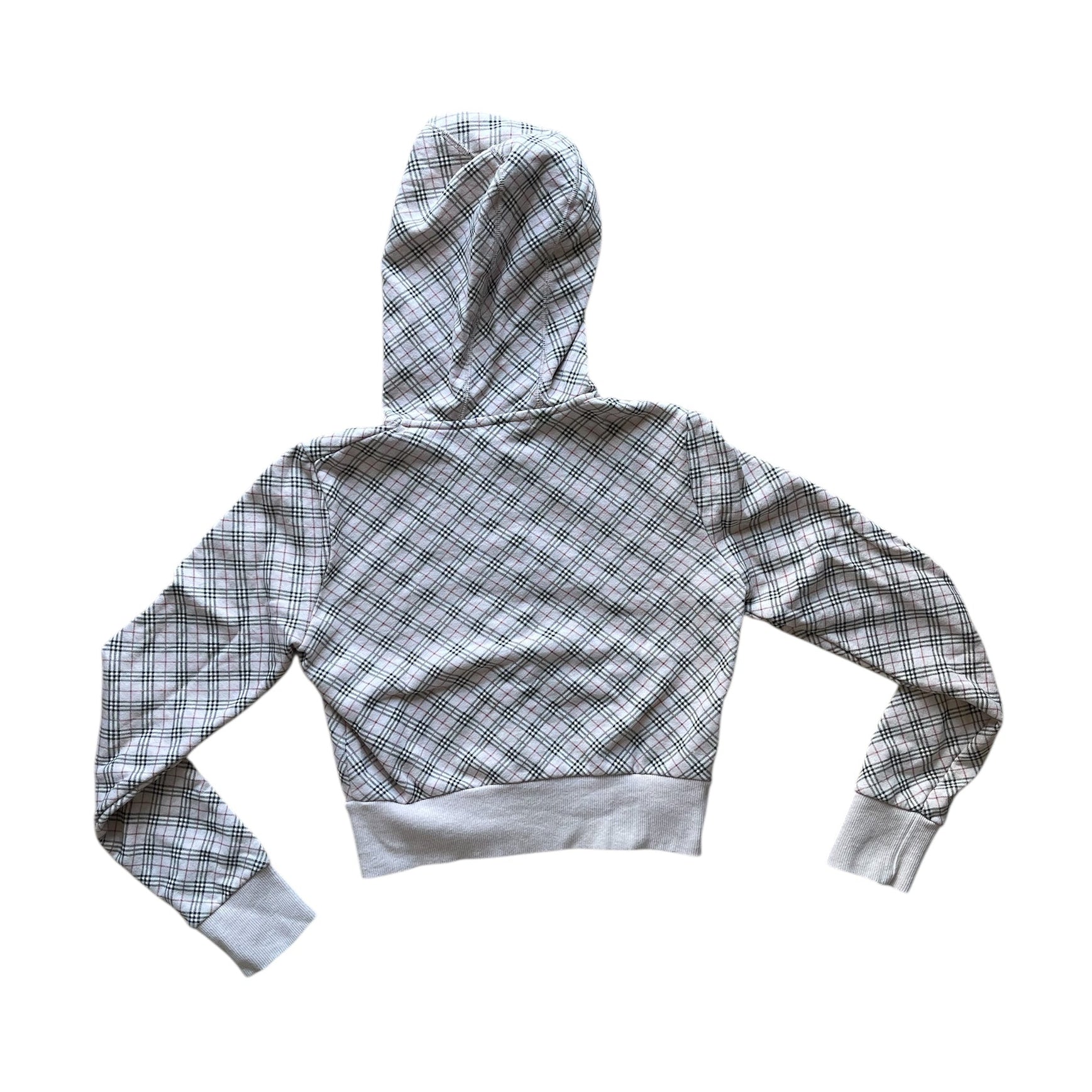 Sweat à capuche court zippé à motif tartan beige et gris, avec poches kangourou et finitions côtelées.