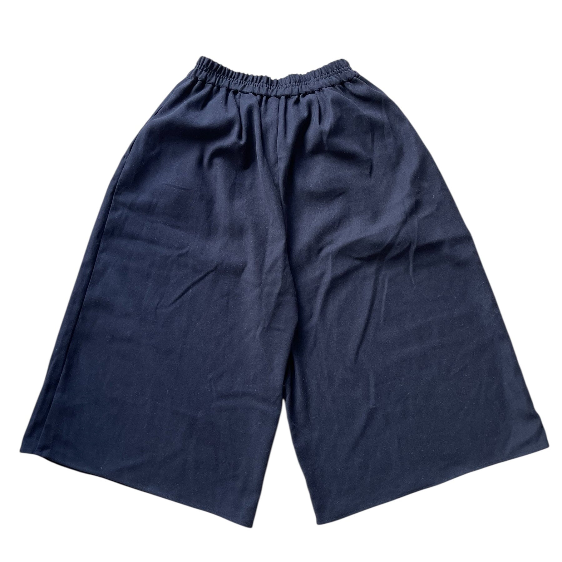 Pantalon large noir fluide type jupe-culotte avec taille élastique