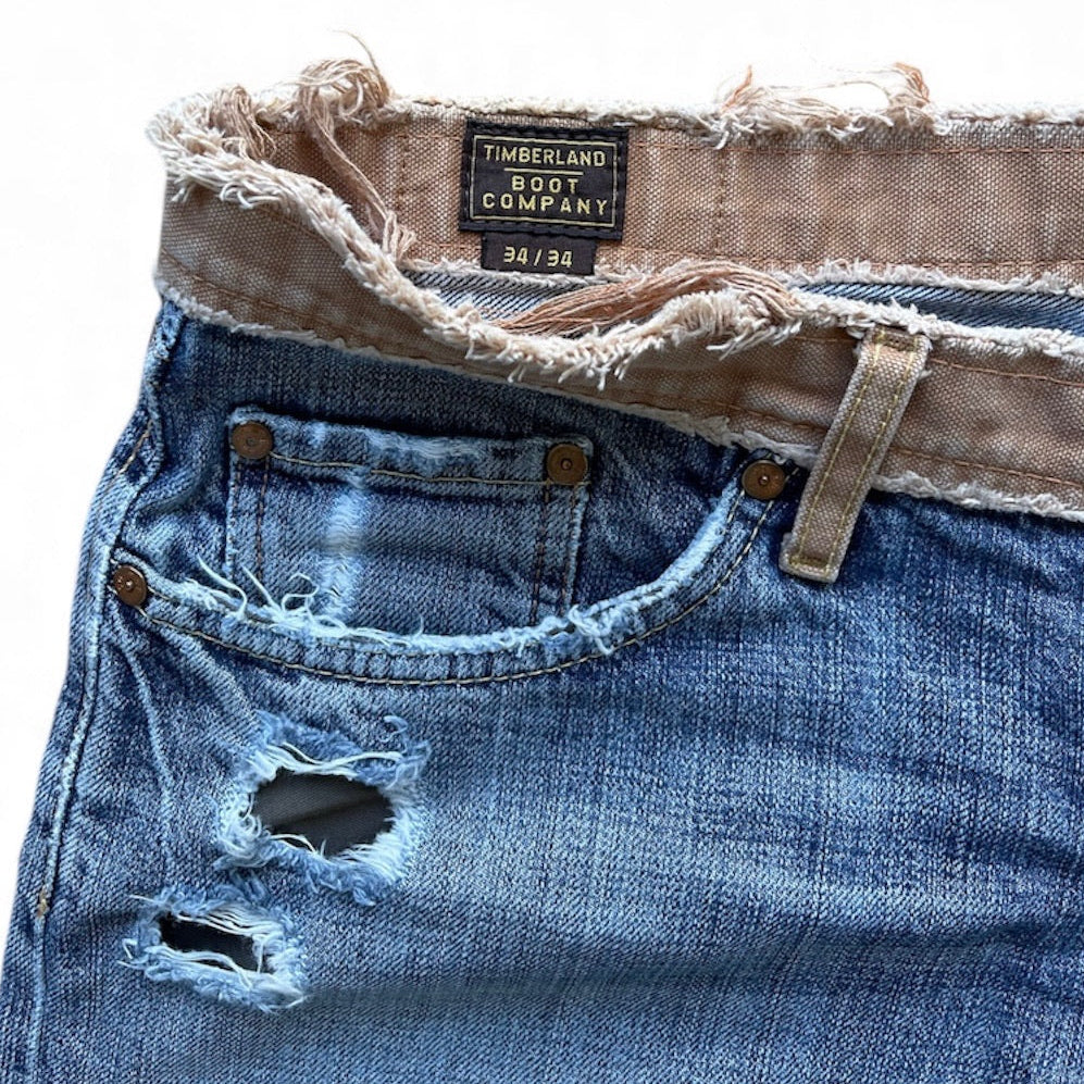 Jean Timberland vintage bleu droit avec effet usé et ceinture effilée