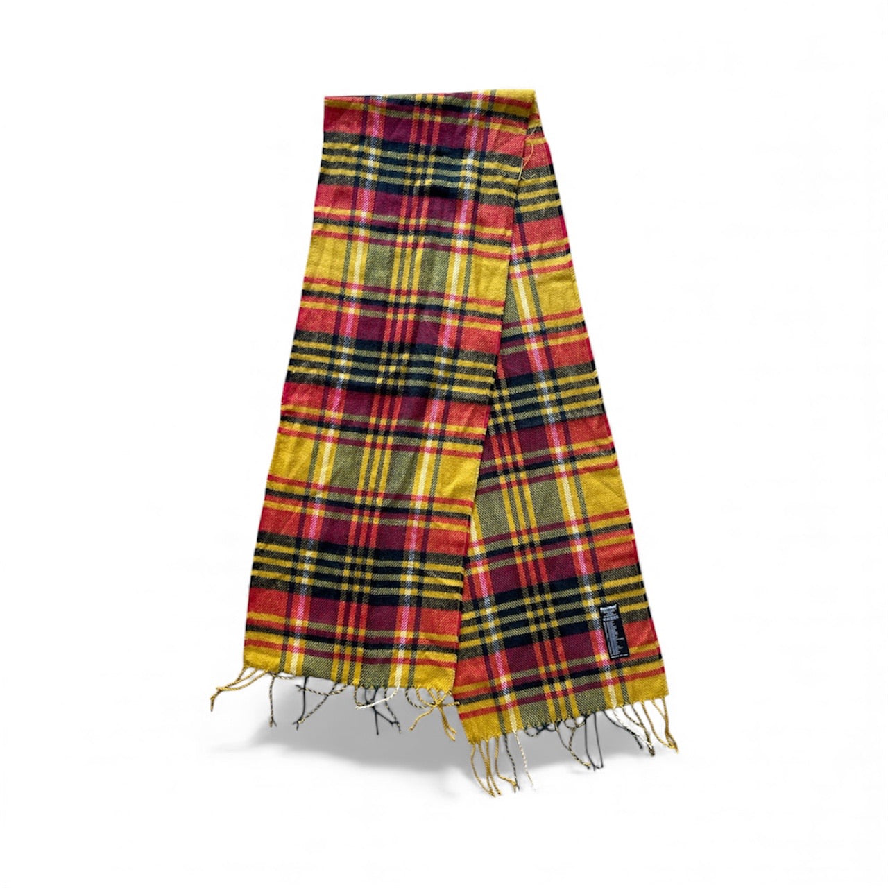 Écharpe tartan à carreaux rouges, jaunes et bleus avec franges, texture douce et épaisse, style unisexe pour l’automne et l’hiver.