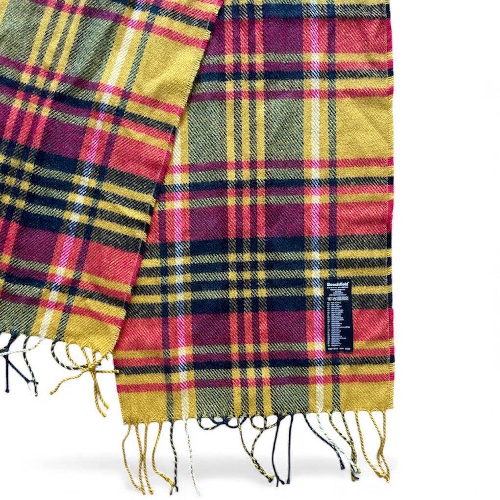 Écharpe tartan à carreaux rouges, jaunes et bleus avec franges, texture douce et épaisse, style unisexe pour l’automne et l’hiver.