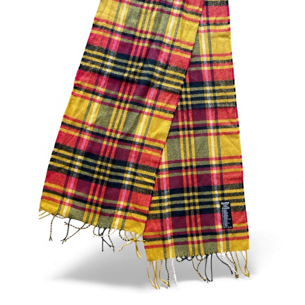 Écharpe tartan à carreaux rouges, jaunes et bleus avec franges, texture douce et épaisse, style unisexe pour l’automne et l’hiver.