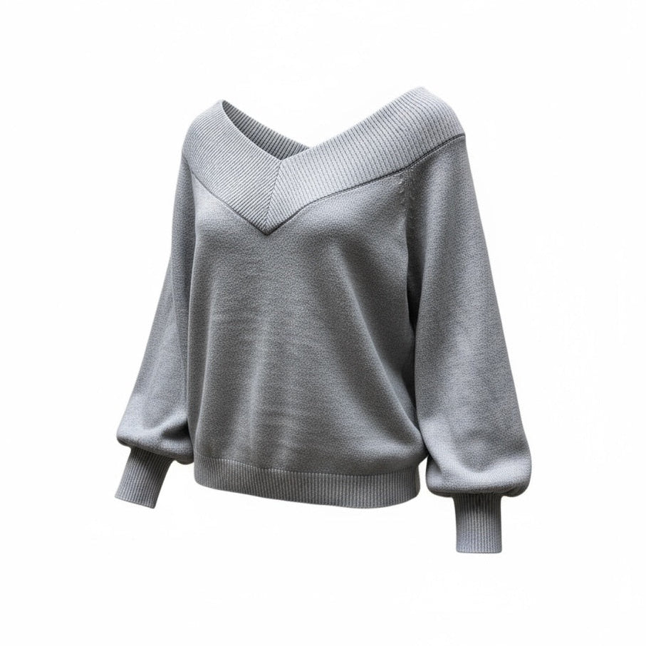 Pull beige à col V large Jacqueline de Yong, manches longues bouffantes et maille douce fluide.