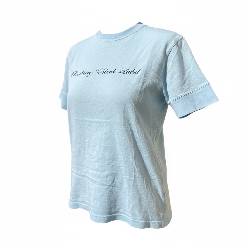 T-shirt bleu clair Burberry Black Label en coton avec logo sur la poitrine, taille M, article vintage avec un petit trou sur la manche