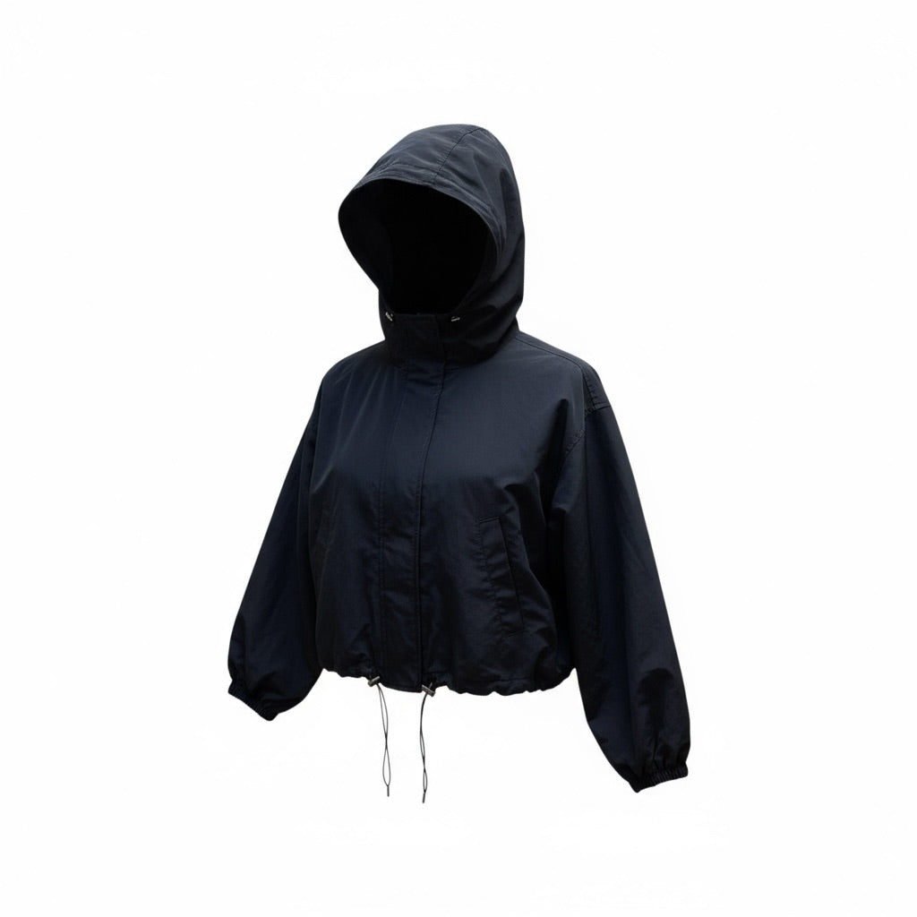 Veste coupe-vent noire Sheena avec capuche, boutons-pression et cordon de serrage, taille M/L